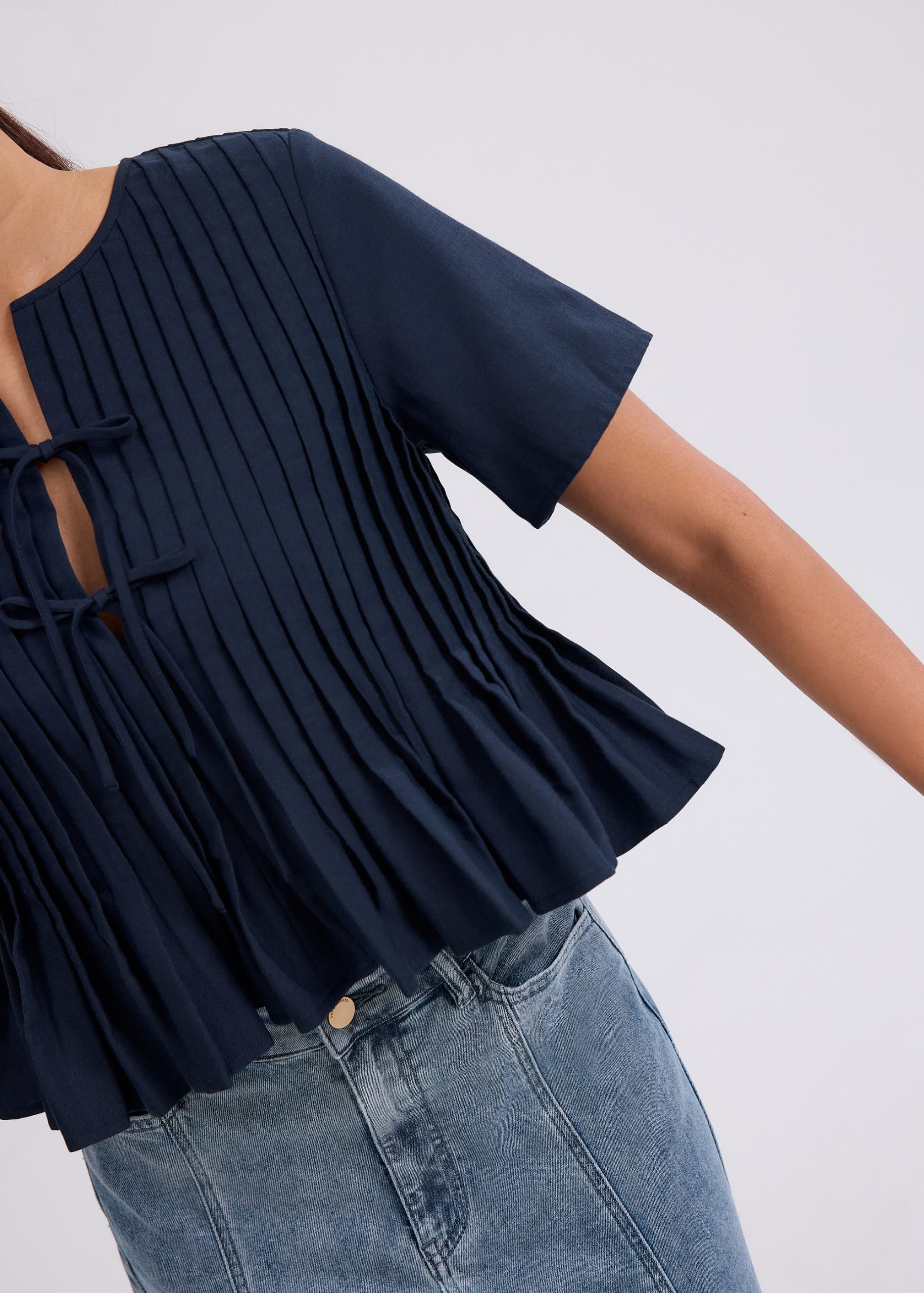 Oxford Pintuck Notched Peplum Top - Image 11