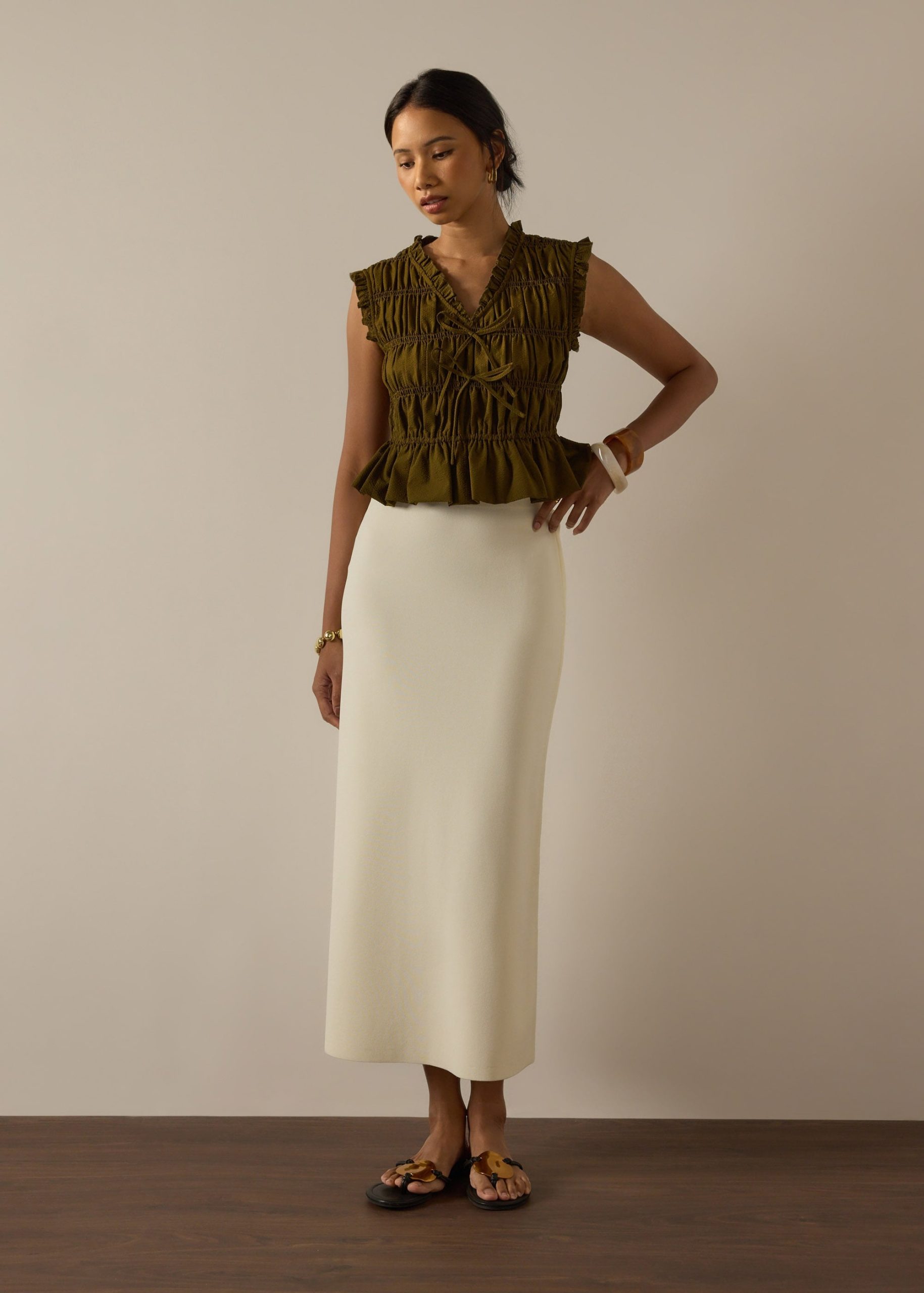 Smocked Fitted Peplum Top